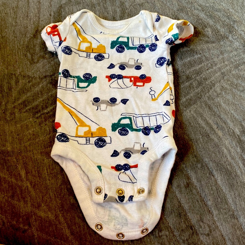 White onesie with tractor